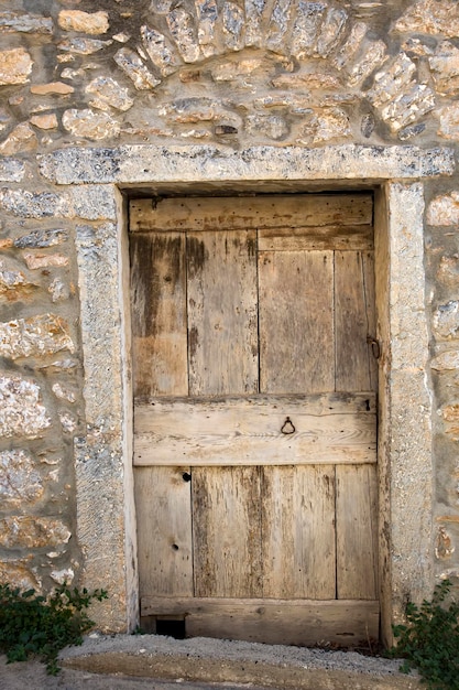 Old door, wooden and wall texture background