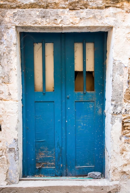 Old door, wooden and wall texture background