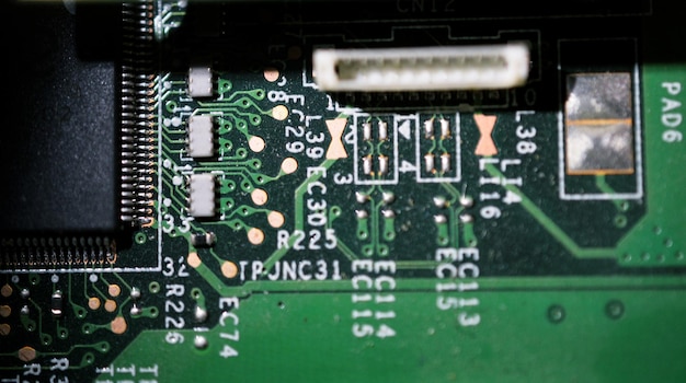 Old dusty and dirty laptop circuit board closeup