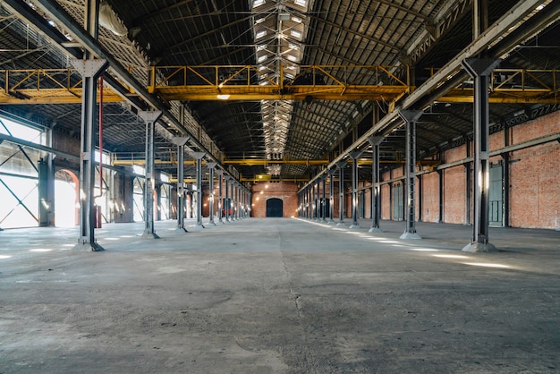 Old and dusty warehouse with light coming through openings