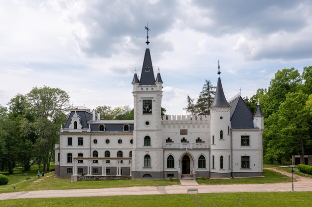 Old fairytale palace in Stameriena Latvia Summer time aerial drone view