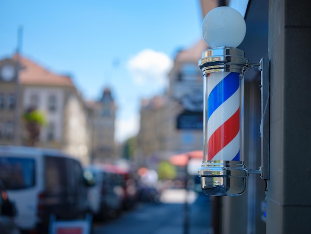 Old Fashioned Barbershop Pole over city street