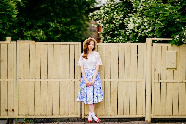 Old fashioned stylish woman posing outdoor