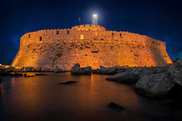 The old fortress and the lighthouse on Rhodes island Greece