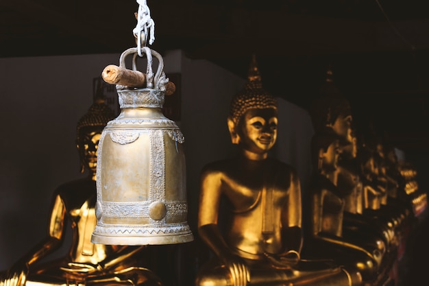 Old golden bells in the temple at Thailand 