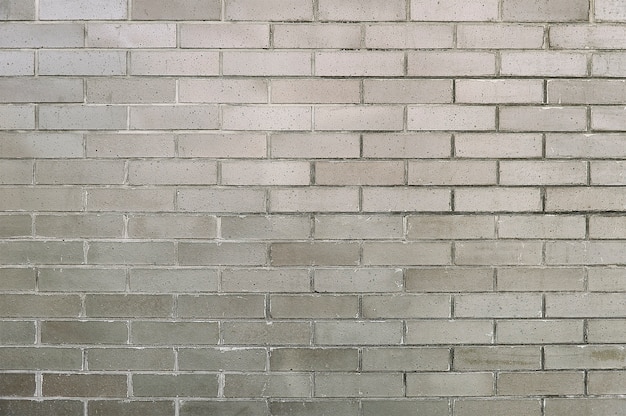 Old grey brick wall background