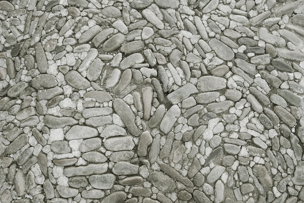 Old grey stone pavement background texture