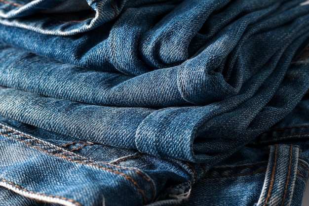 Old grunge blue jeans texture background