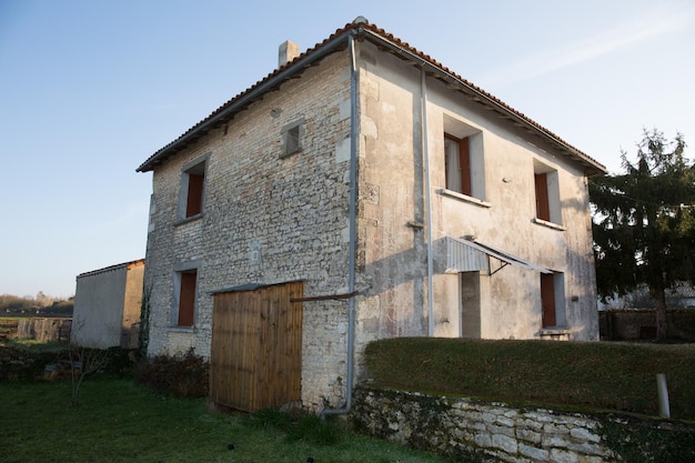 Old house under blue sky in France