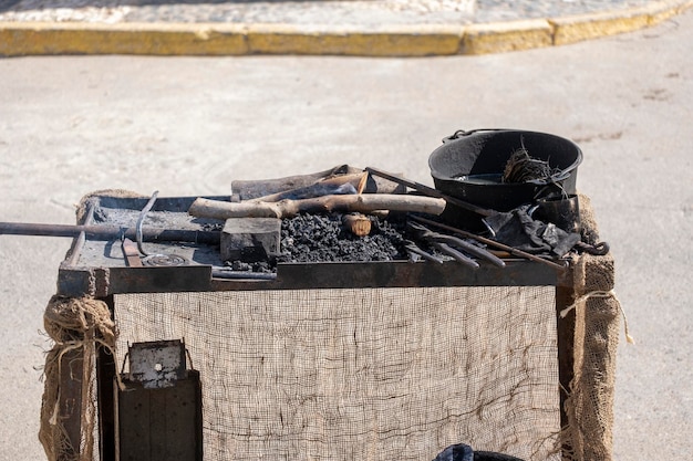 An old iron anvil for forging metal in a smithy or forgeold iron tool