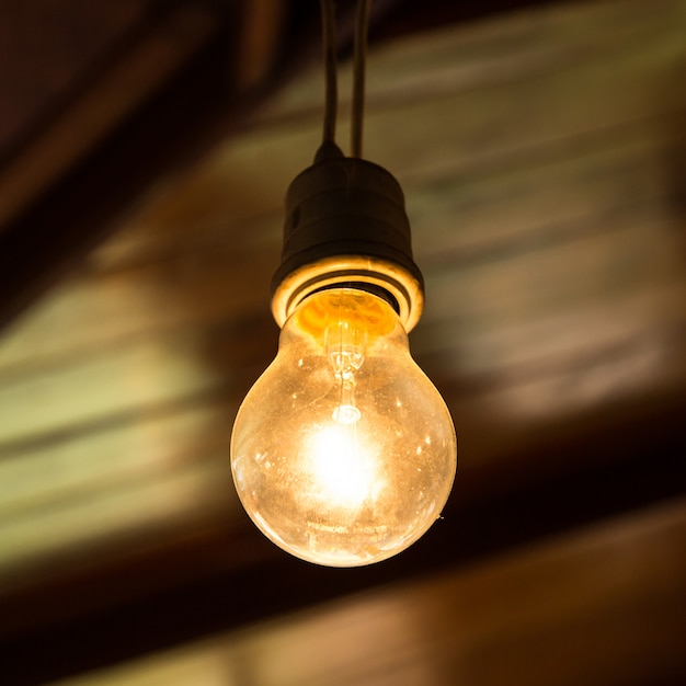 Old light bulb glowing