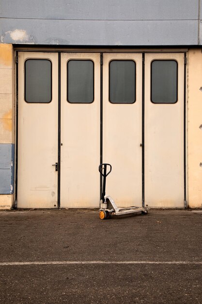 Old light gate to the room and weigh pallet truck