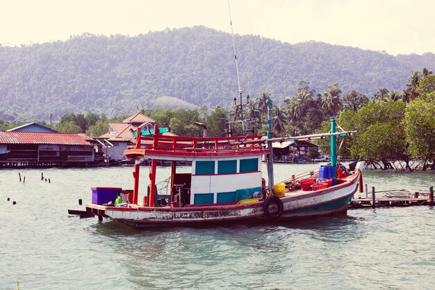 Old longboat on the water