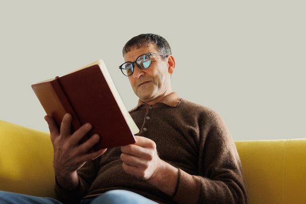 Old man asian professor historian reading old book at home old age leisure and people concept senior