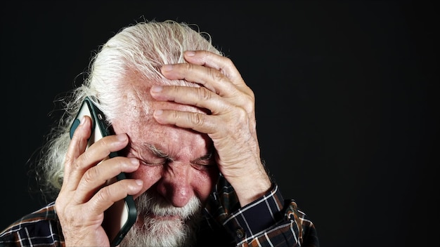 The Old man gets very upset when bad news comes on the phone call