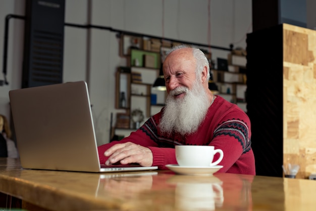 Old man with a laptop