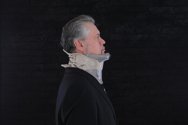 old man with medical neck brace