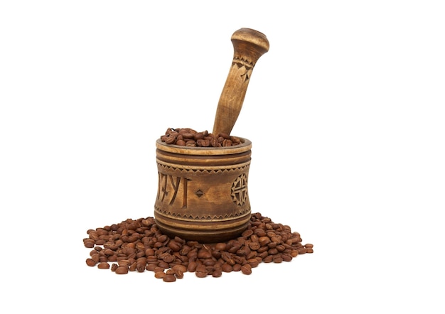 The old mortar , coffee beans on white background