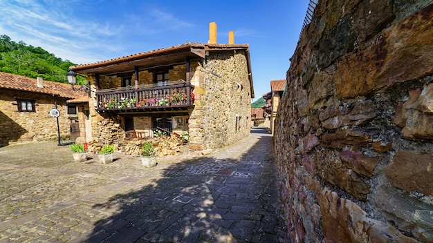 Old mountain village with stone houses and cobbled alleys