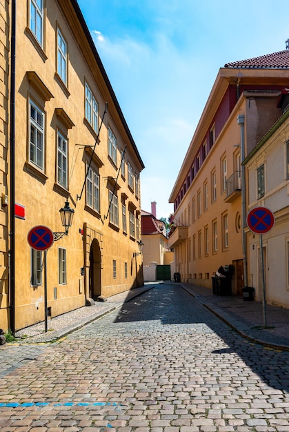 Old narrow street of Prague at dawn