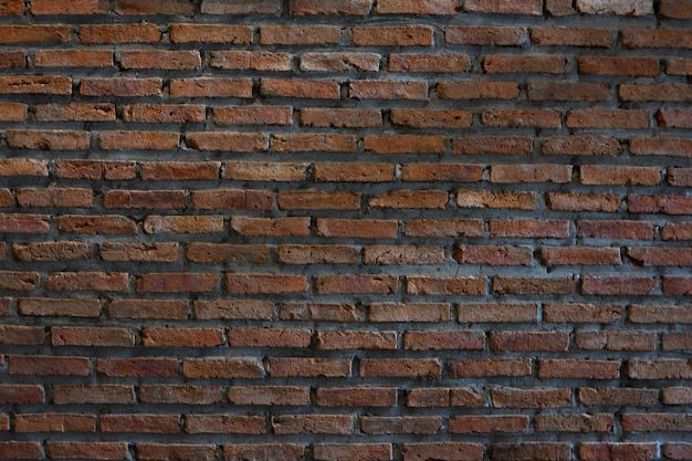 Old orange stone brick background and texture