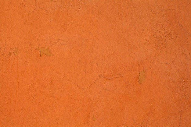 Old orange textures wall background Perfect background with space