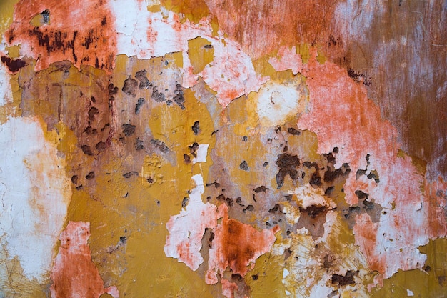 Old paint texture peeling off concrete. Wall background.