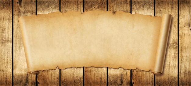 Old paper horizontal banner Parchment scroll on a wood board