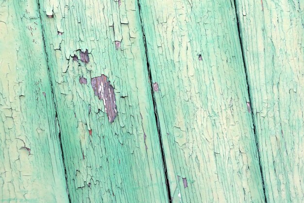 Old peeling paint on a wooden background wood texture