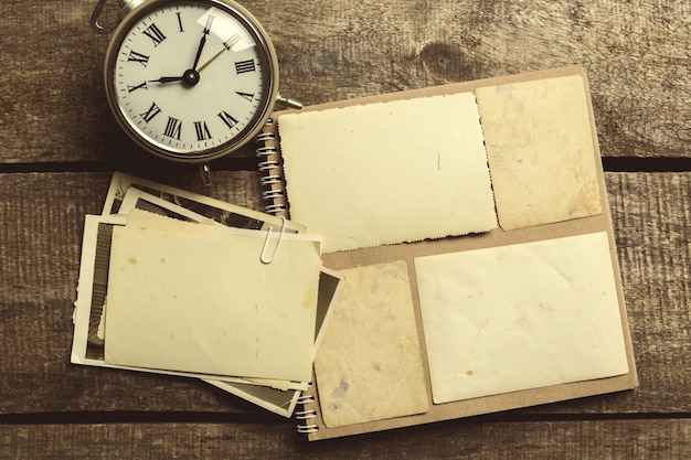 Old photos on the wooden table