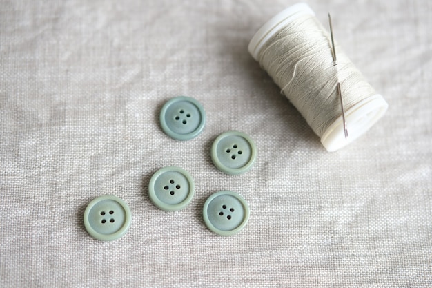 Old plastic buttons in different colors on the background. tinting