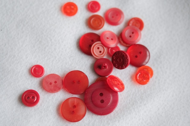 Old plastic buttons in different colors on the background. tinting