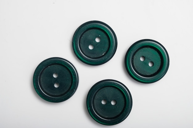 Old plastic buttons in different colors on the background. tinting