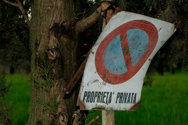 Old private property sign on a country road