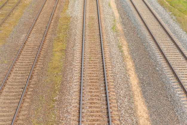 Photo old railway tracksaerial view of three train tracks at summer daytop view