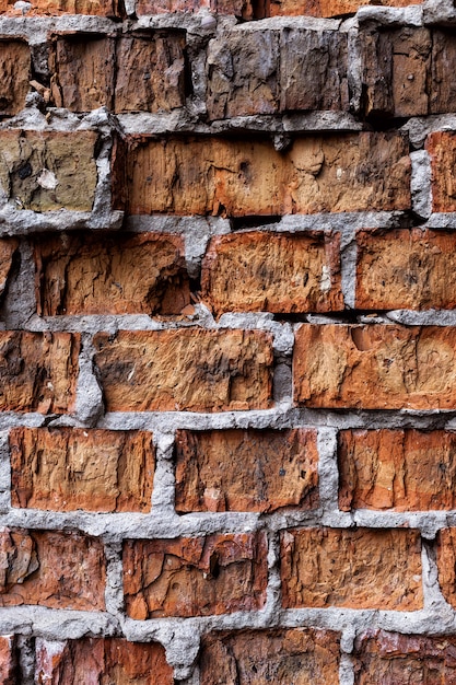 Old red brick wall, rustic, shattered texture