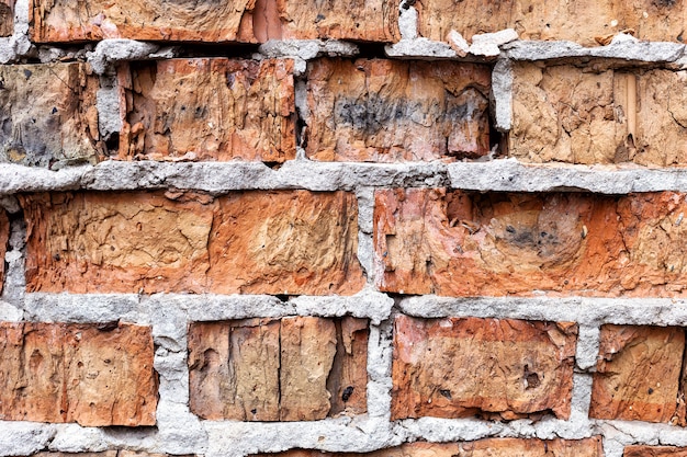 Old red brick wall, rustic, shattered texture