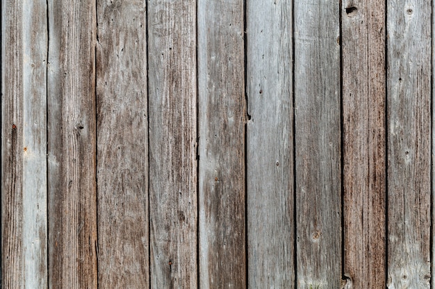 Old rustic dark wooden texture - wood background .