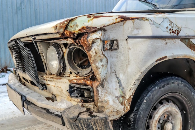 Old rusty Russian car Rust on the metal of a vintage car