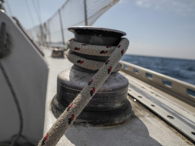 Old sailboat sheet winch sail detail Yachting Sailing winch and rope of a yacht Sheet Cable pulley