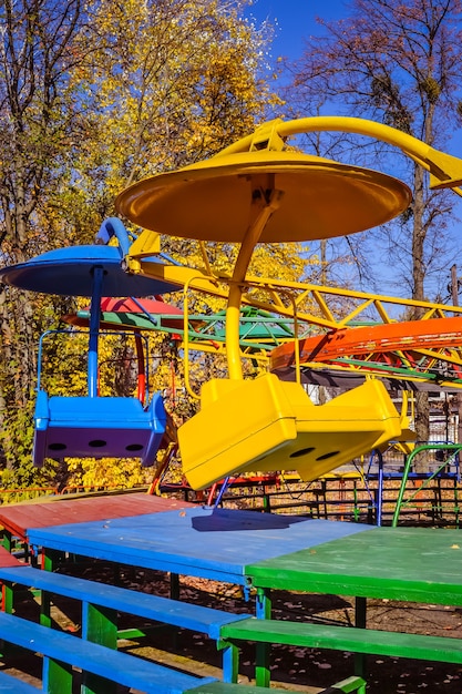 Old soviet rides in the autumn park