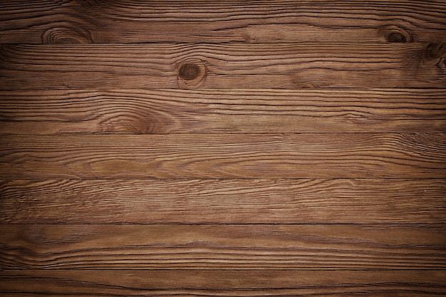 Old spruce wood planks texture on exterior wall of a wooden church