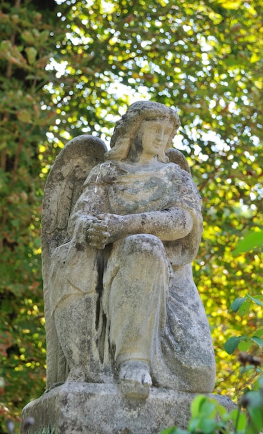 Old statue in Lychakiv Cemetery in Lviv Ukraine