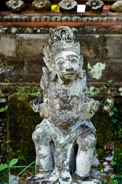 Old statue of mithycal creature on bali indonesia