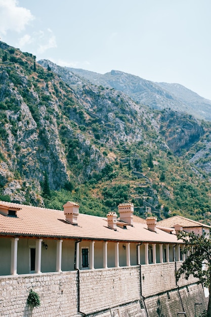 Old stone citadel building with a long arcade kotor montenegro