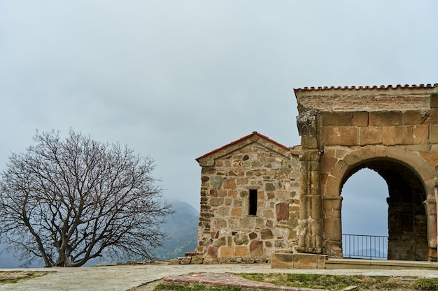 An old stone fortress in the mountains.