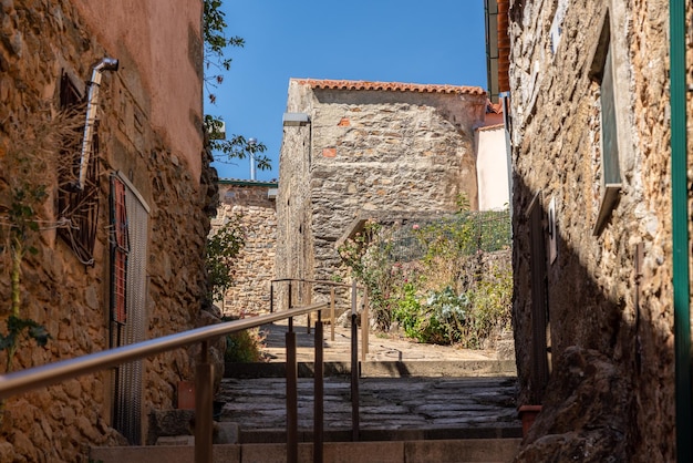 Old stone houses and narrow street in the ancient town of Castelo Rodrigo in Portugal