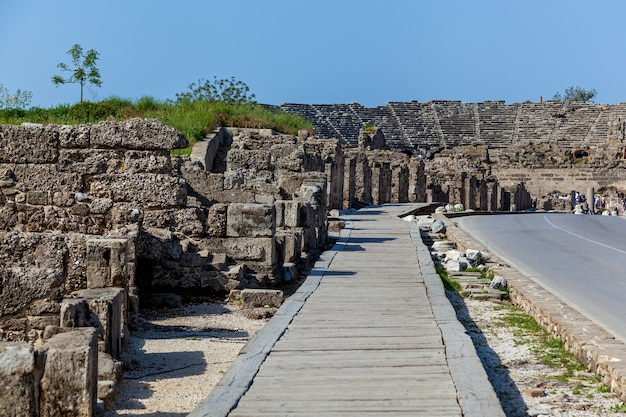 Old stone road with columns and ruins of the city of Side Turkey