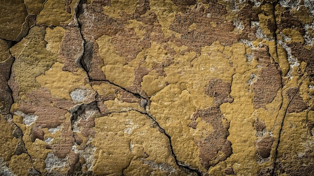 Old stone wall with a crack. texture for design