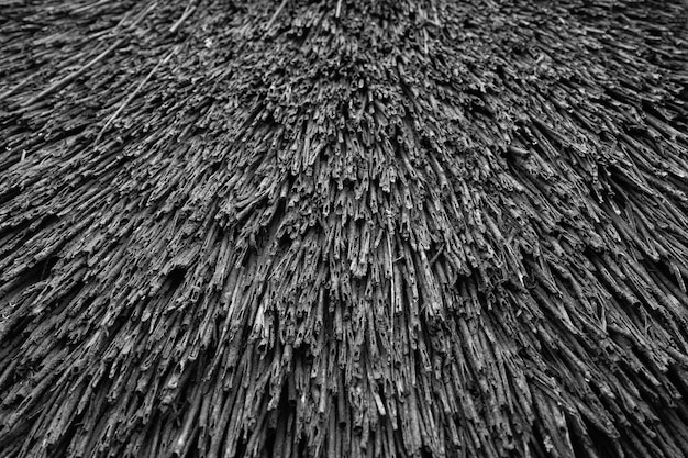 Old straw background The texture of the old thatched roof Architectural vintage